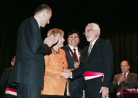 Antonio Brack und Angela Merkel